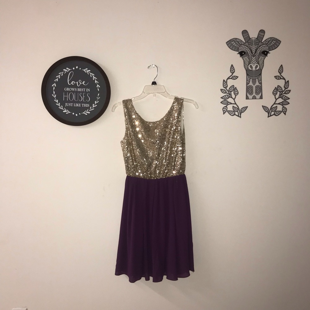 Francesca’s purple and gold dress